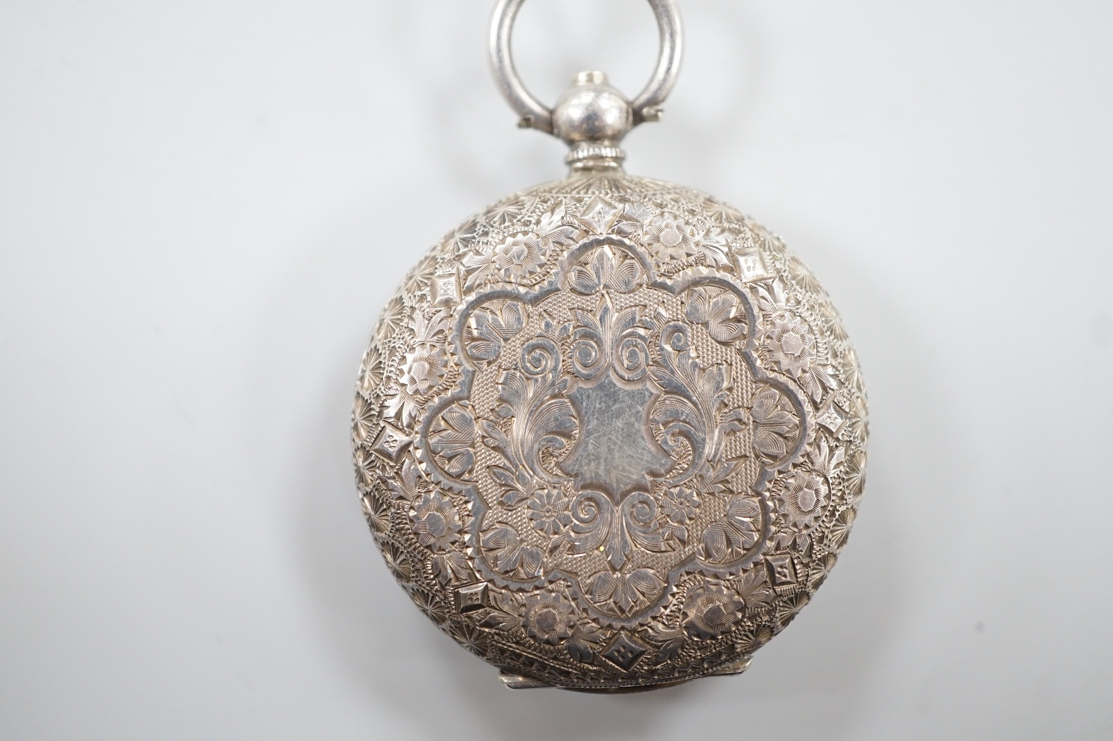 A Swiss 935 white metal fob watch with purple guilloche enamelled Roman dial.